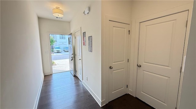32 S Auburn Landing Pl, Auburn, GA 30011 - corridor with baseboards and dark wood finished floors