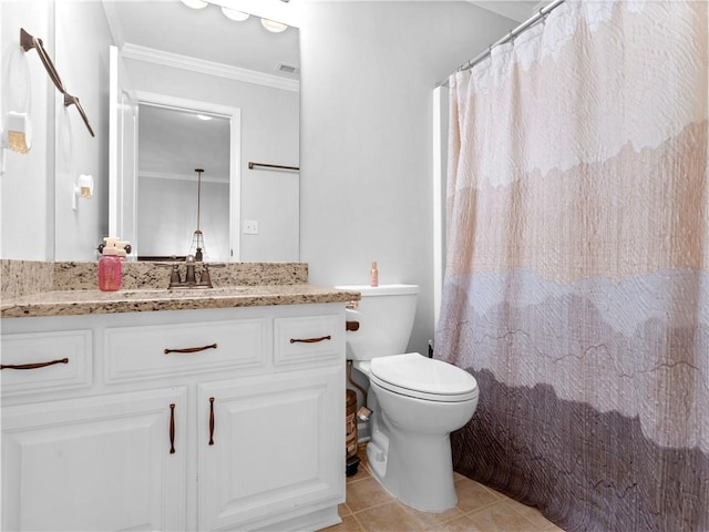 bathroom featuring tile patterned flooring, vanity, ornamental molding, and toilet