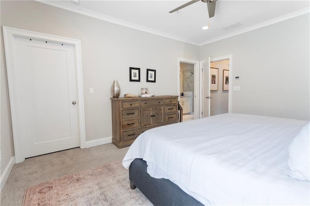 bedroom featuring light colored carpet, visible vents, ensuite bathroom, baseboards, and ornamental molding