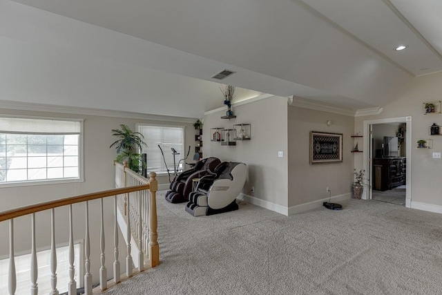 interior space with visible vents, baseboards, lofted ceiling, carpet, and crown molding