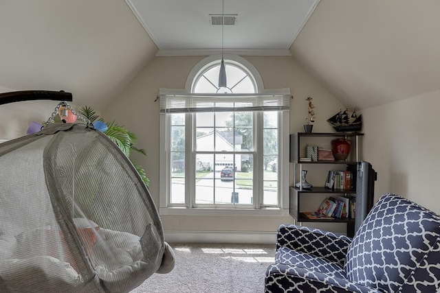 bedroom featuring lofted ceiling, visible vents, and carpet flooring