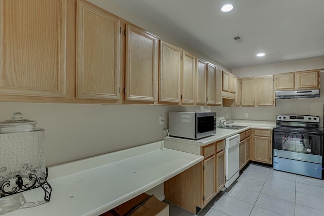 kitchen featuring under cabinet range hood, stainless steel appliances, a sink, and light brown cabinetry