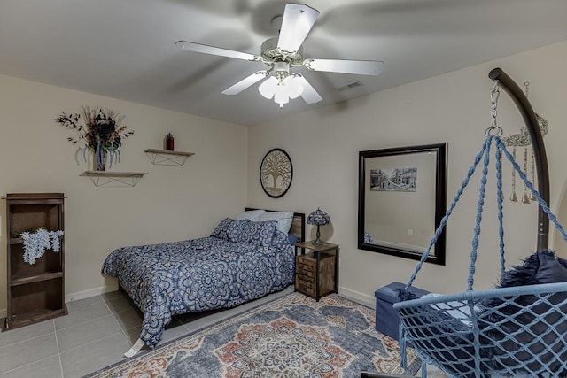 tiled bedroom with ceiling fan, visible vents, and baseboards