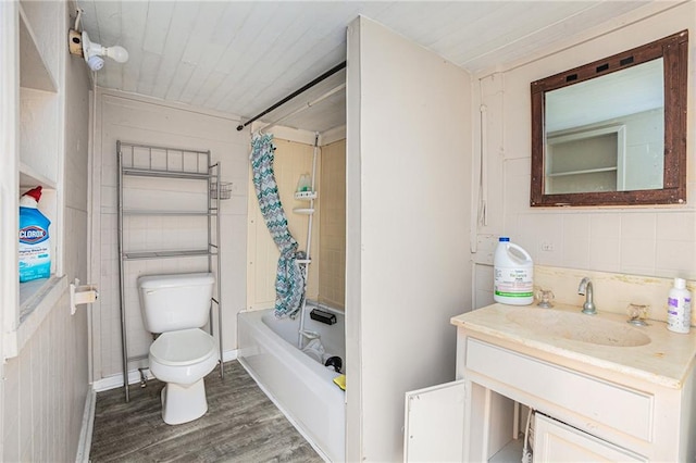 full bathroom with shower / bathing tub combination, vanity, toilet, and hardwood / wood-style flooring