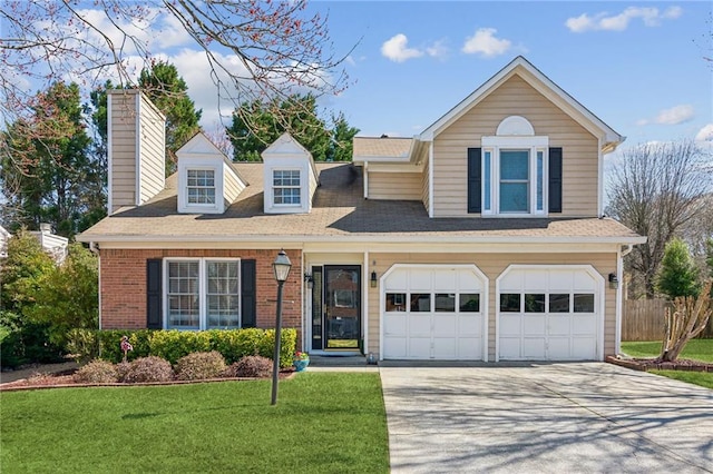 view of front of property featuring brick siding, a chimney, a front yard, a garage, and driveway