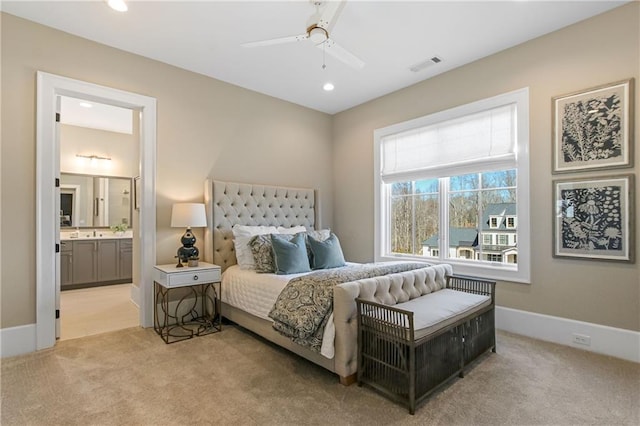 bedroom with light carpet, baseboards, and visible vents