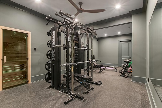 exercise area featuring baseboards, a ceiling fan, and recessed lighting