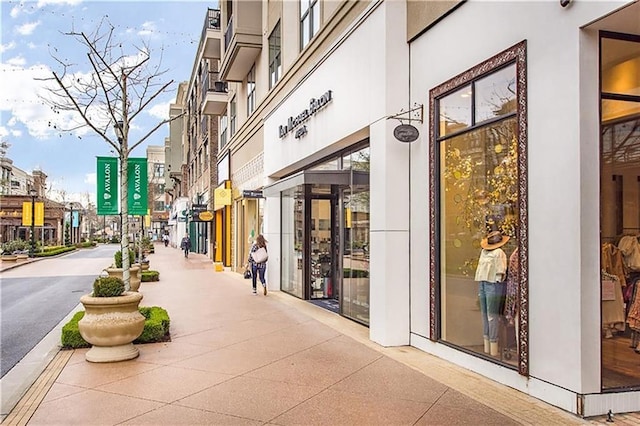 view of exterior entry featuring stucco siding