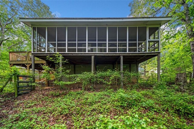 500 Nolan Rd, Carrollton, GA 30116 - rear view of house with a sunroom