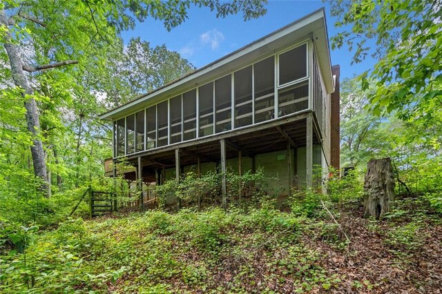 500 Nolan Rd, Carrollton, GA 30116 - back of house with a sunroom