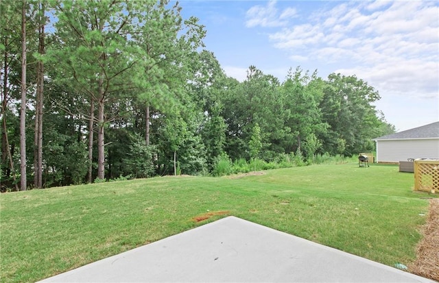 386 Rock View Ln, Covington, GA 30016 - view of green lawn featuring a patio area