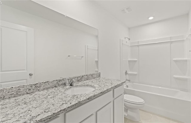 full bathroom featuring vanity, shower / tub combination, tile patterned floors, and toilet