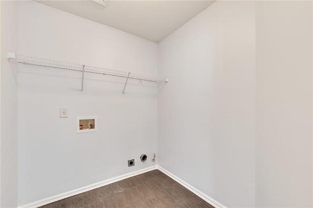 laundry area with hookup for an electric dryer, dark hardwood / wood-style floors, and washer hookup