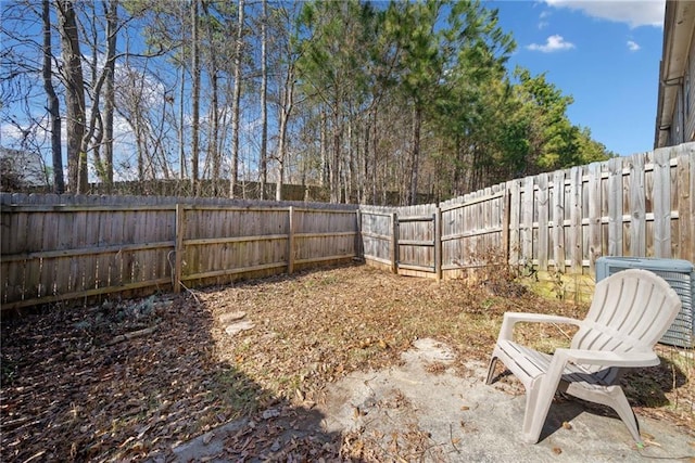 view of yard with central AC