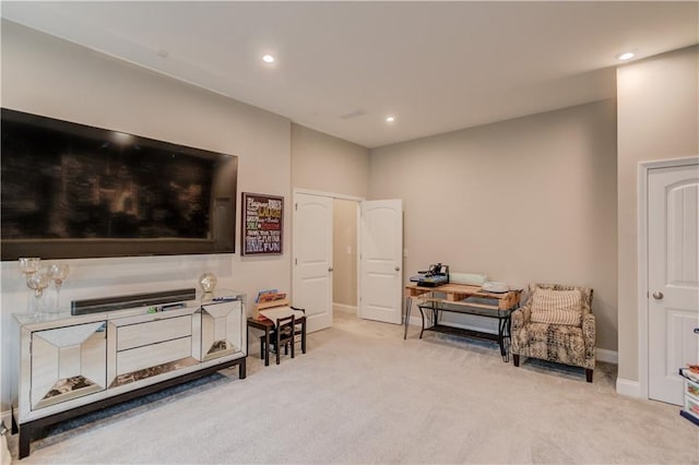 sitting room with baseboards, carpet floors, and recessed lighting
