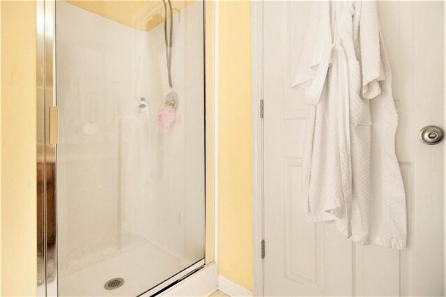 full bathroom with a stall shower