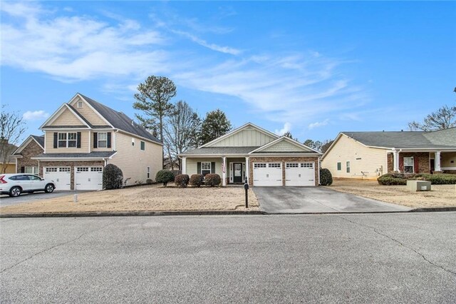 view of front of home featuring concrete driveway