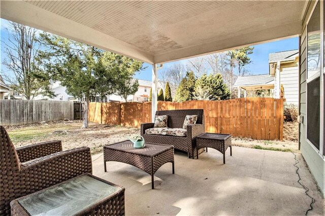 view of patio / terrace with a fenced backyard and an outdoor hangout area