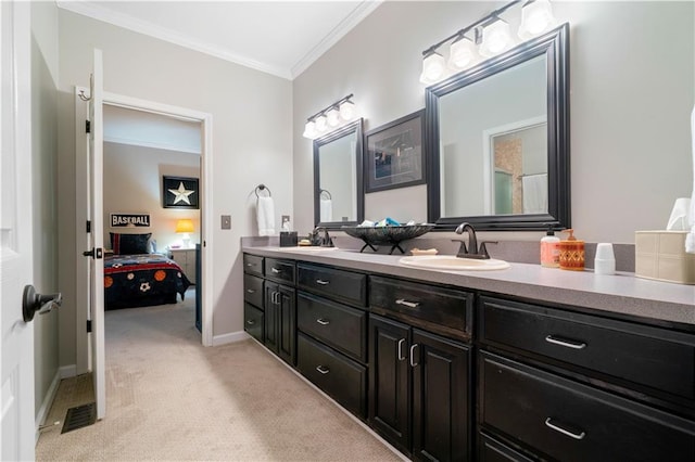 full bathroom with ornamental molding, double vanity, connected bathroom, and baseboards