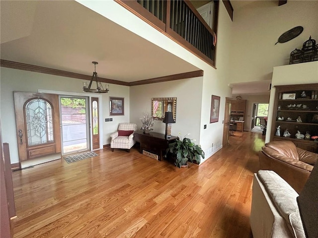 72 Wild Cherry Ln, Big Canoe, GA 30143 - foyer entrance featuring light wood-style floors, baseboards, and crown molding