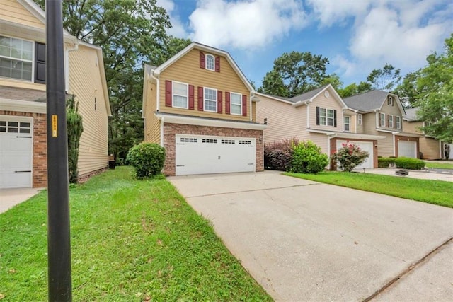 2165 Capella Cir S, Fulton, GA 30331 - traditional-style house with an attached garage, driveway, a front lawn, and brick siding