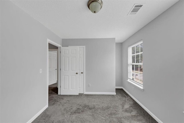 2165 Capella Cir S, Fulton, GA 30331 - empty room with carpet floors and a textured ceiling