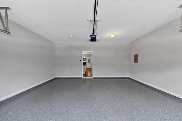 2165 Capella Cir S, Fulton, GA 30331 - garage featuring a garage door opener and electric panel