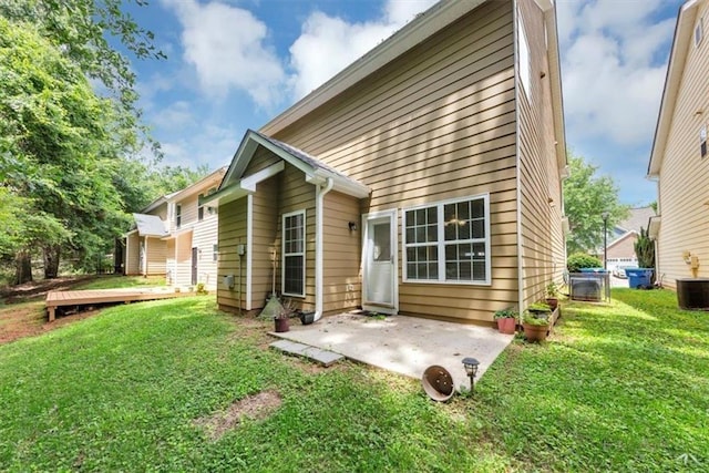 2165 Capella Cir S, Fulton, GA 30331 - back of property with a patio area and a yard