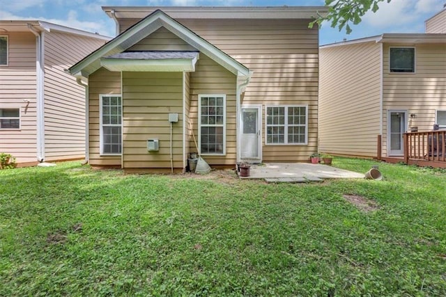 2165 Capella Cir S, Fulton, GA 30331 - rear view of house featuring a patio and a lawn