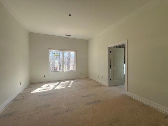 unfurnished room with ornamental molding, visible vents, and baseboards