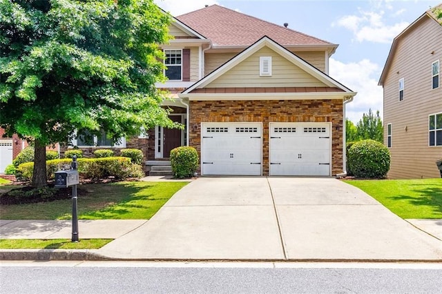 craftsman-style home with a garage and a front lawn