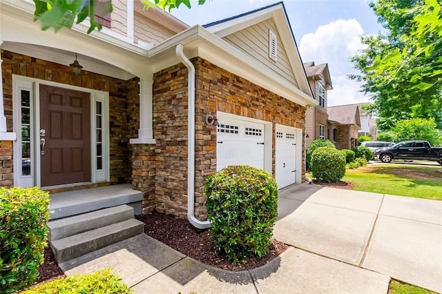 property entrance with a garage