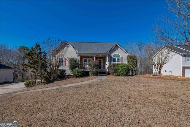 ranch-style house featuring a front yard and a porch