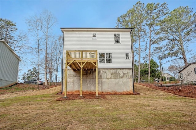 back of house with a yard