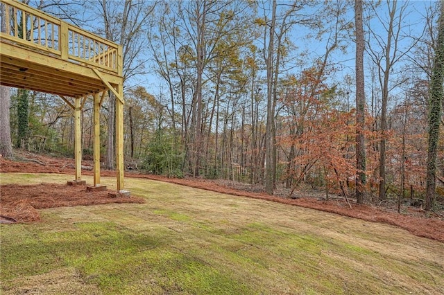 view of yard with a deck