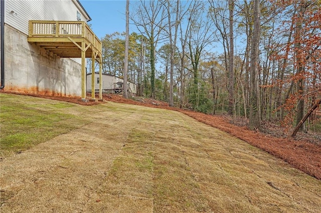 view of yard featuring a deck