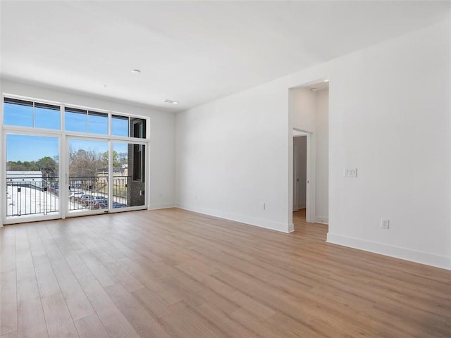 675 Drewry St NE Unit 205, Atlanta, GA 30306 - empty room with light wood finished floors and baseboards