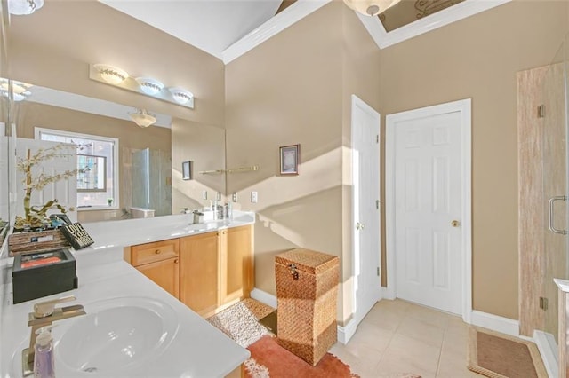 full bathroom with a shower stall, tile patterned flooring, ornamental molding, and vanity