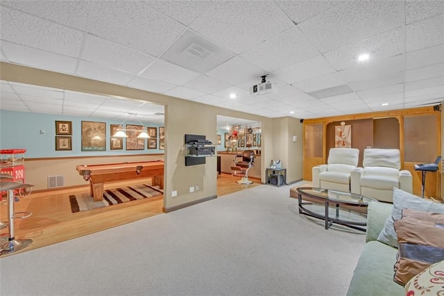 carpeted living area with a drop ceiling, recessed lighting, billiards, visible vents, and baseboards