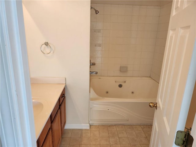 full bathroom featuring a combined bath / shower with jetted tub and vanity