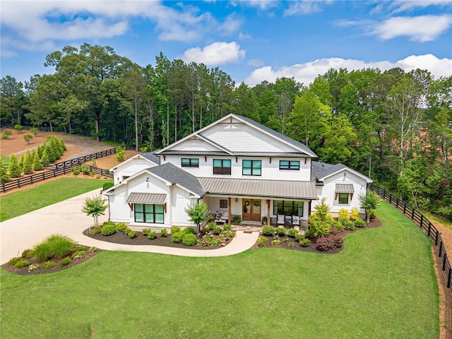 6301 New Bethany Rd, Buford, GA 30518 - modern inspired farmhouse with a porch, driveway, metal roof, french doors, and a standing seam roof