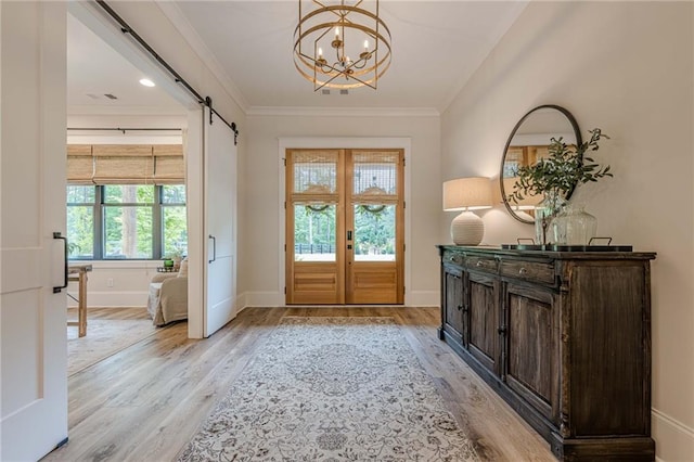 6301 New Bethany Rd, Buford, GA 30518 - entrance foyer featuring light wood finished floors, baseboards, a barn door, a chandelier, and crown molding