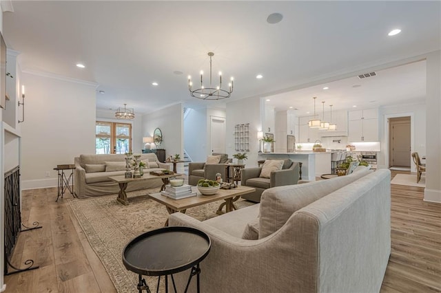 6301 New Bethany Rd, Buford, GA 30518 - living room featuring a chandelier, light wood-style flooring, recessed lighting, baseboards, and crown molding