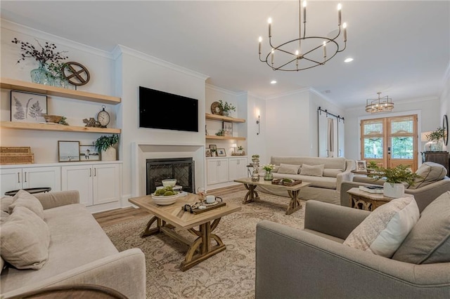 6301 New Bethany Rd, Buford, GA 30518 - living area with a chandelier, crown molding, wood finished floors, recessed lighting, and a fireplace