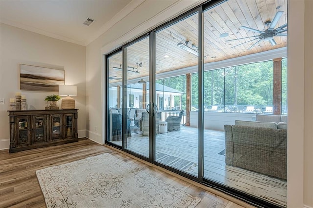 6301 New Bethany Rd, Buford, GA 30518 - doorway to outside with ceiling fan, wood finished floors, baseboards, and ornamental molding