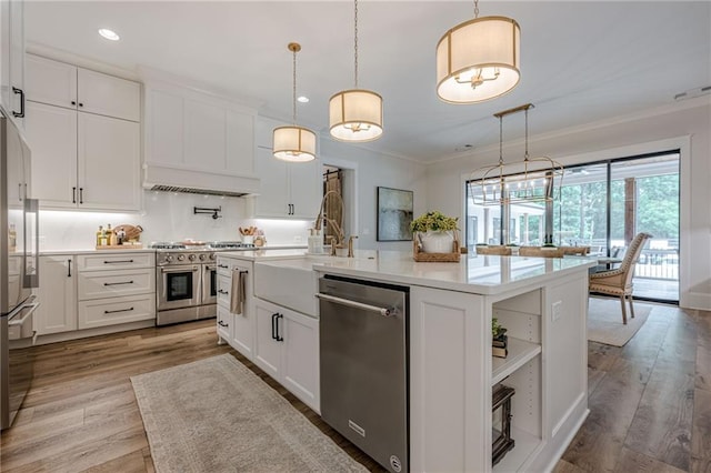 6301 New Bethany Rd, Buford, GA 30518 - kitchen featuring high quality appliances, ornamental molding, light countertops, white cabinets, and recessed lighting