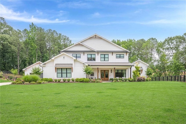 6301 New Bethany Rd, Buford, GA 30518 - modern farmhouse style home with covered porch, board and batten siding, and a standing seam roof