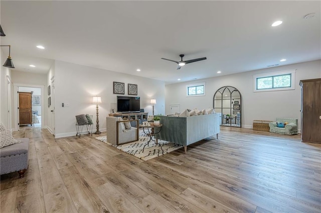 6301 New Bethany Rd, Buford, GA 30518 - living room with light wood finished floors, recessed lighting, a ceiling fan, plenty of natural light, and baseboards