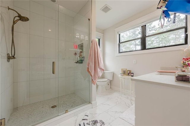 6301 New Bethany Rd, Buford, GA 30518 - bathroom with a stall shower, toilet, vanity, and marble finish flooring