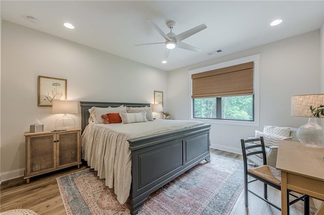 6301 New Bethany Rd, Buford, GA 30518 - bedroom with light wood-style floors, baseboards, ceiling fan, and recessed lighting